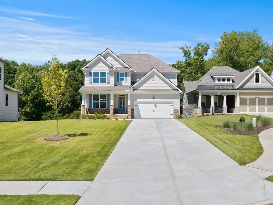 Windsor front exterior with long driveway to two-c