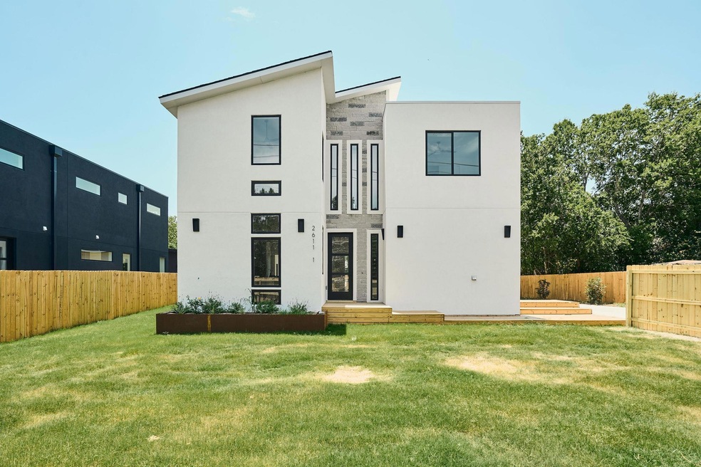 Back of house with stucco siding