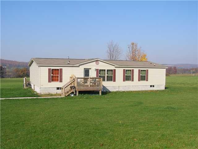 Exterior Front. Newer home on one acre lot with ce