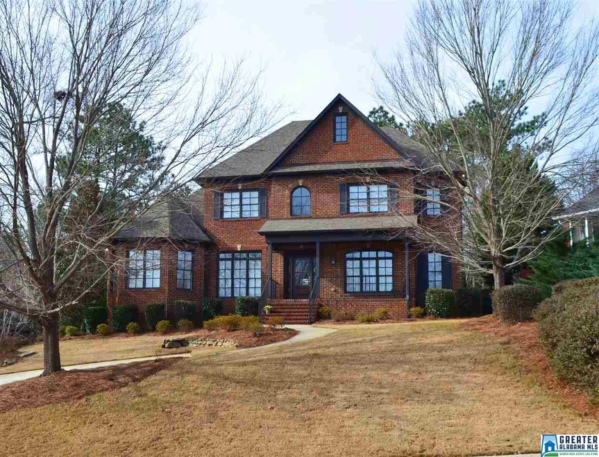 This Brick 4 bedroom 4.5 bath home w finished base