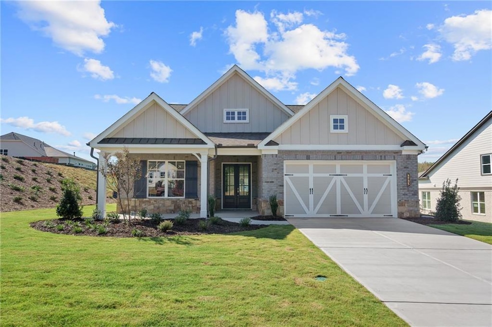 Craftsman inspired home with french doors, a front
