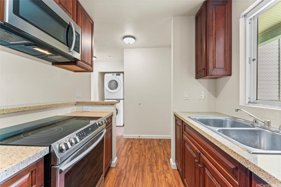 Updated kitchen with quartz counters.
