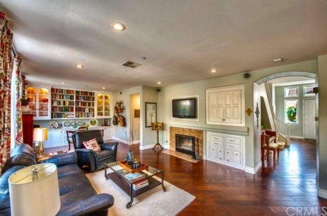 Beautiful extended family room with hardwood floor