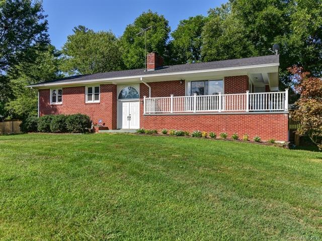 A solid, well-kept brick ranch on a huge lot in de