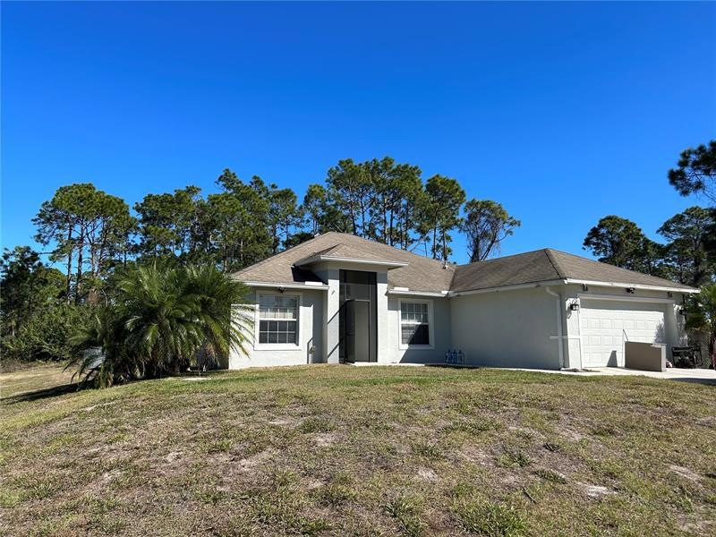 1039 Green Field St, Lehigh Acres, FL 33974 - photo 1