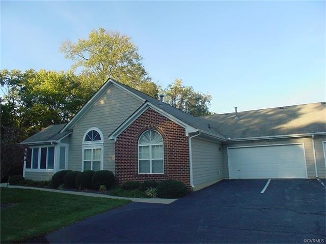 Front view with 2 car garage