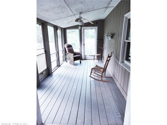 Other. Enclosed Porch Area Looking Over Backyard
