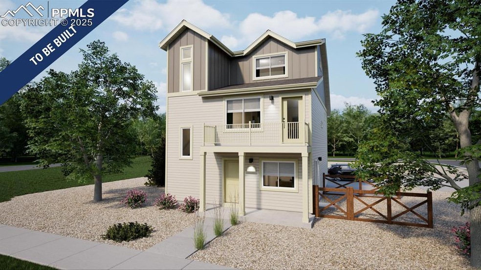 View of front facade with a balcony and board and batten siding