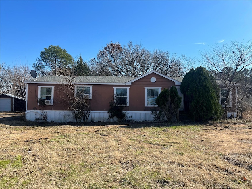 View of front of house featuring a front yard