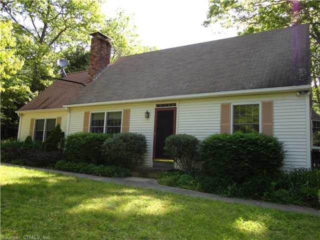 Exterior Front. Meticulously landscaped grounds!