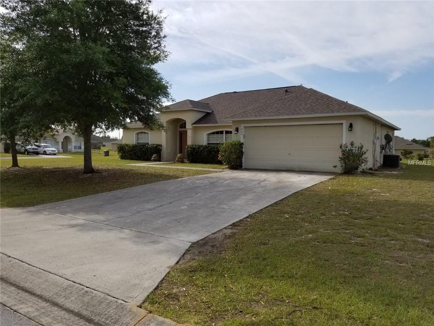 569 Hatchwood Dr, Haines City, FL 33844 - photo 1