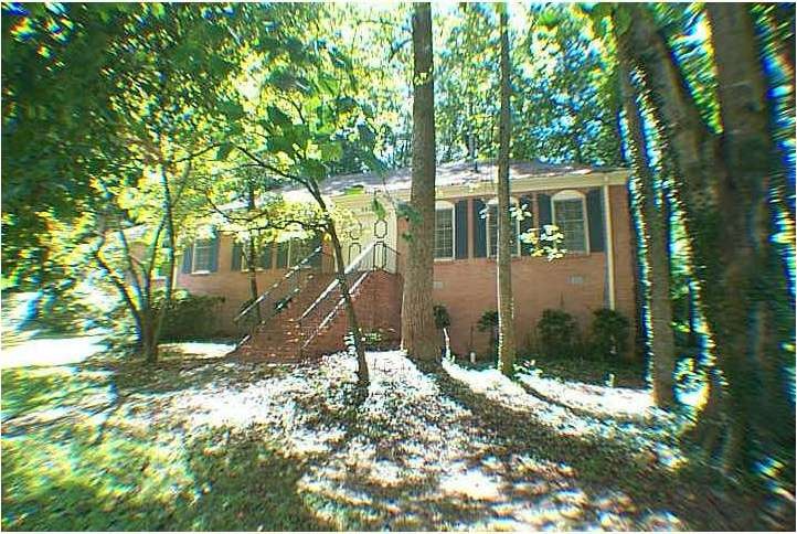 Exterior Front. Beautiful all Brick home on .7 acr