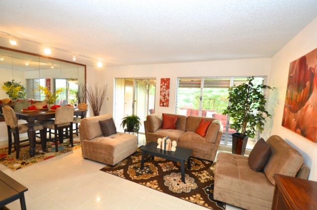 Spacious 'Great Room' concept with open living, di