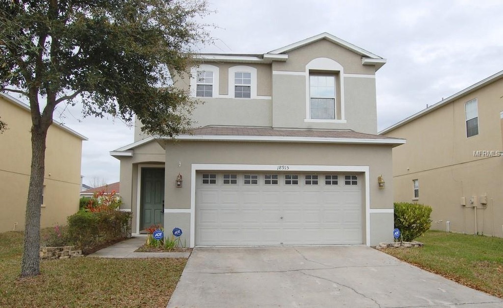 18915 Sunterra Dr, Land O Lakes, FL 34638 - photo 1