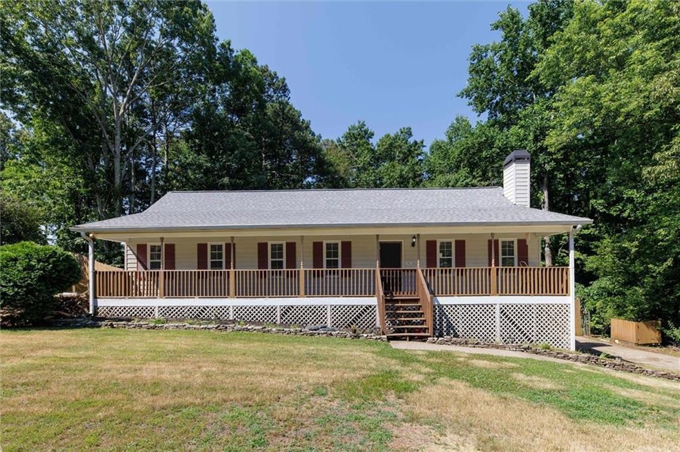 View of the Ranch-style house with a front yard