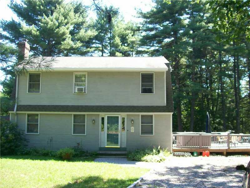 Exterior Front. Full dormered Cape