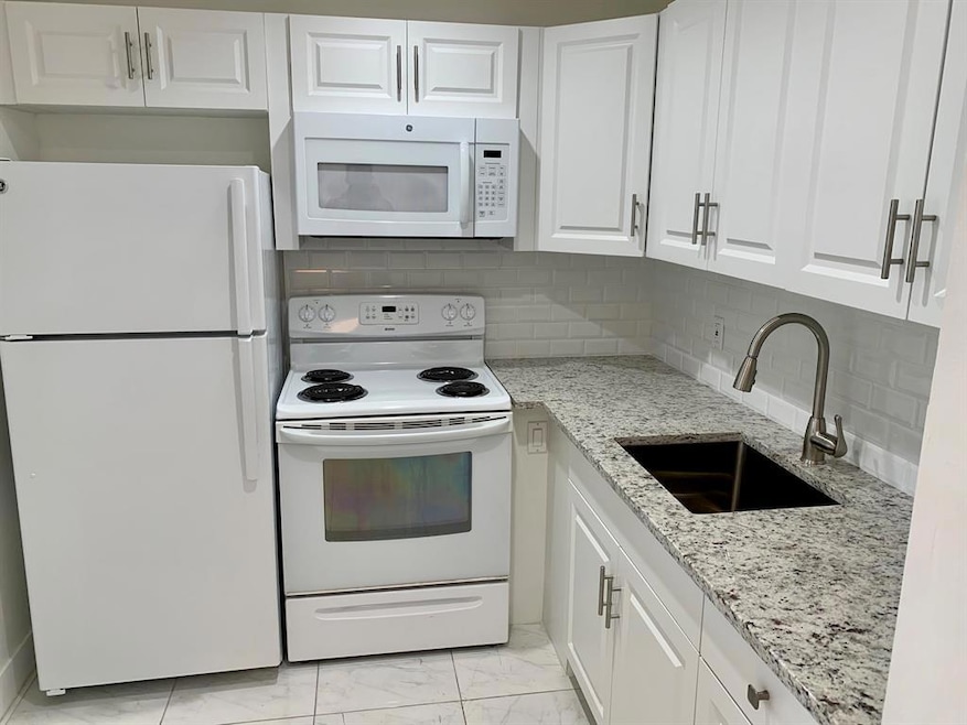 9 Windsor A, West Palm Beach, FL 33417 - photo 1