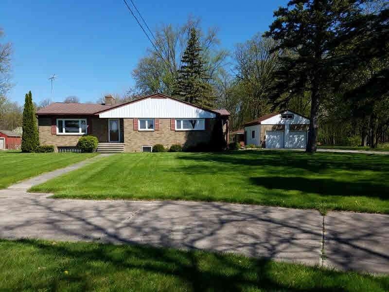 Set back from the road with a circular drive. Updated floor coverings.