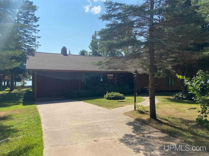 45576 N Rabbit Bay Rd, Torch Lake, MI 48845 - photo 1