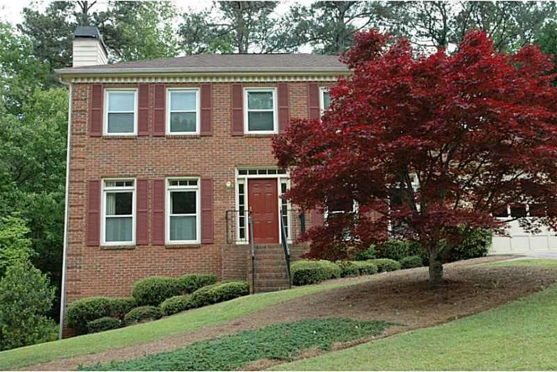 Exterior Front. Impeccably maintained brick beauty