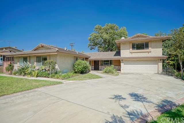 Front facade with custom master bedroom above the 