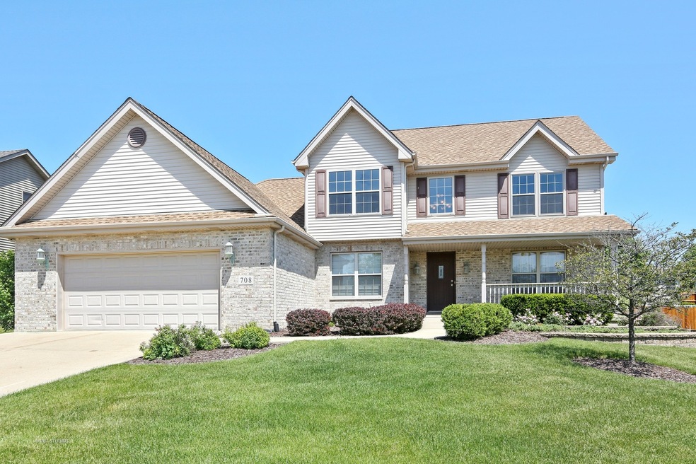Lovely front porch welcomes you to this stunning h
