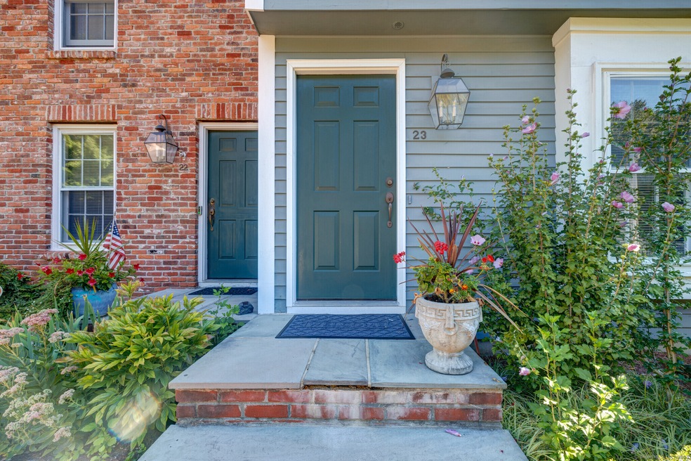 WELCOME HOME... nicely located end unit offering 2