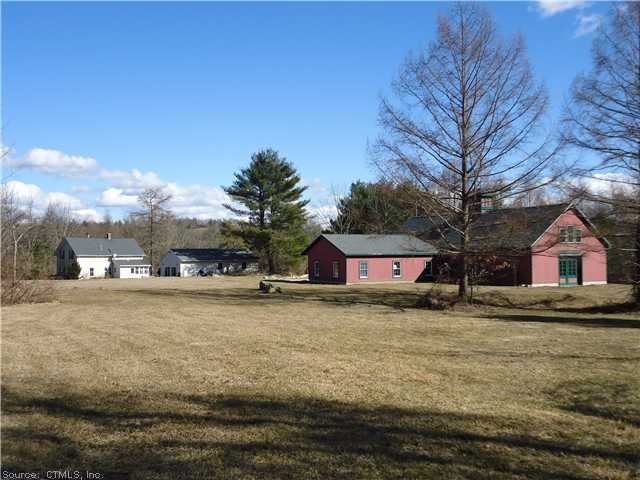 Land/Lot. View showing the rear of the barn, garag