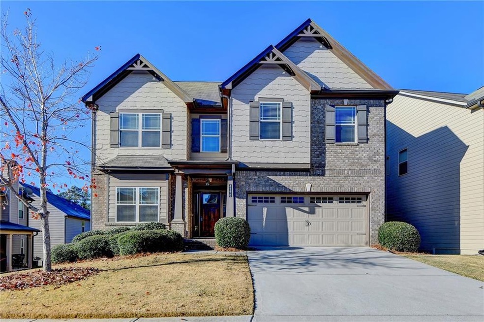 Craftsman-style home featuring a garage