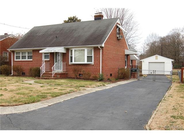 Frontal View.  Paved Driveway, Walk Way, Fenced Ya