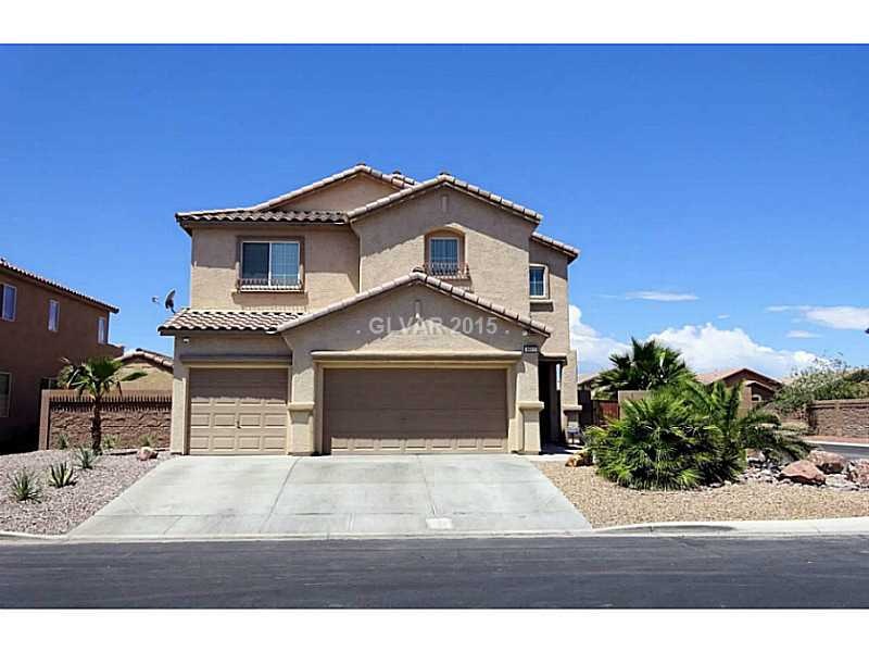 Property Photo. Front photo showing corner lot.