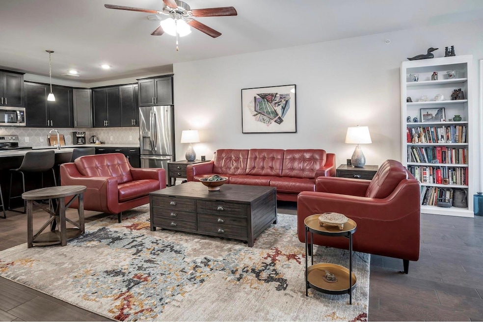 Living room wood-type flooring, and ceiling fan