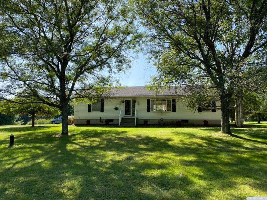 Lovely Ranch home w/level 2+ Acre yard