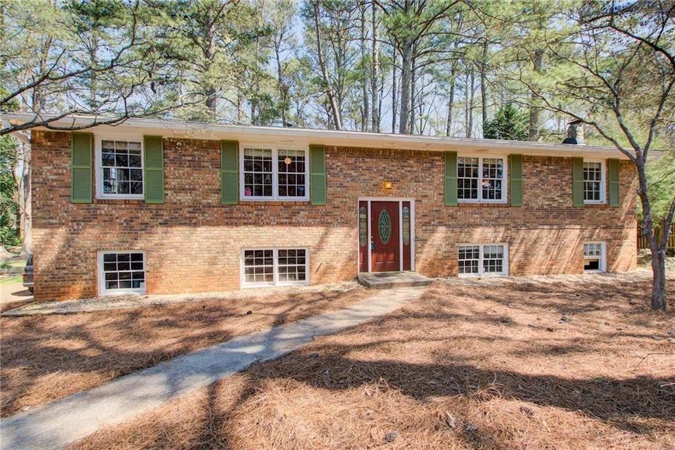 Split foyer home with brick siding