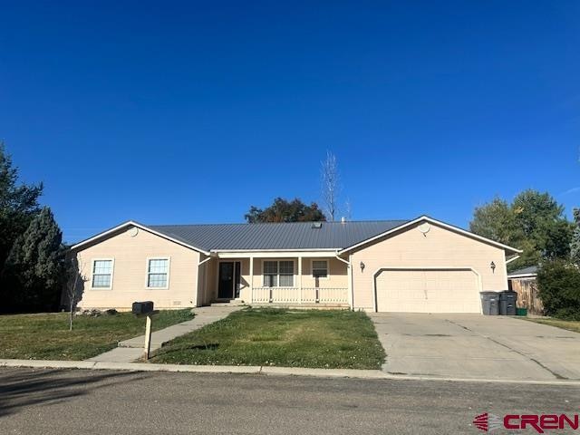 433 N Erin St, Cortez, CO 81321 - photo 1