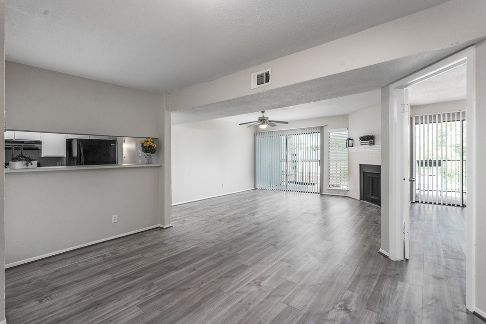Welcome to 2822 S. Bartell #1. New laminate floori