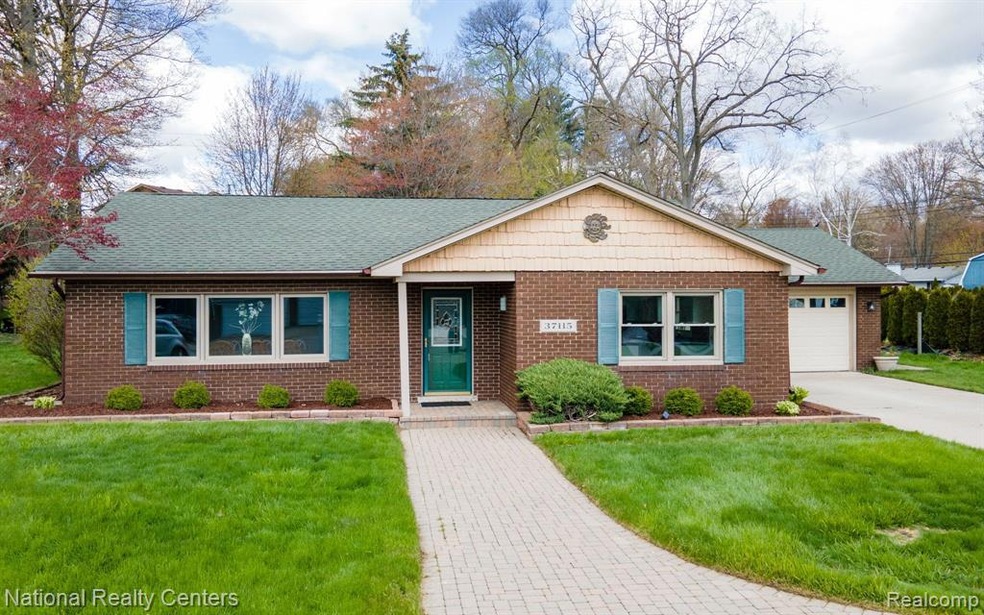Beautifully landscaped brick home