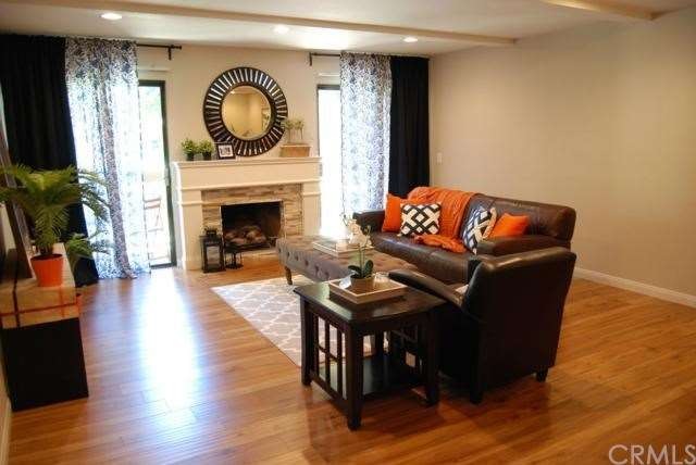 Stacked Stone Faced Fireplace w/Custom Mantle
