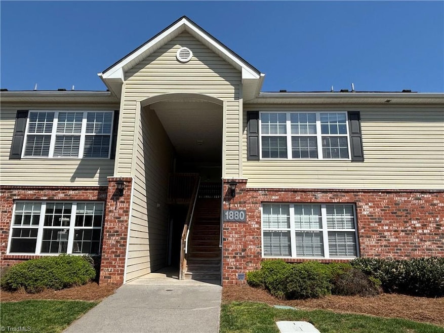 Front of building unit is the right top condo