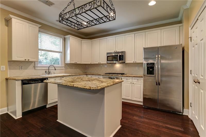 Updated Kitchen featuring Granite and Stainless St