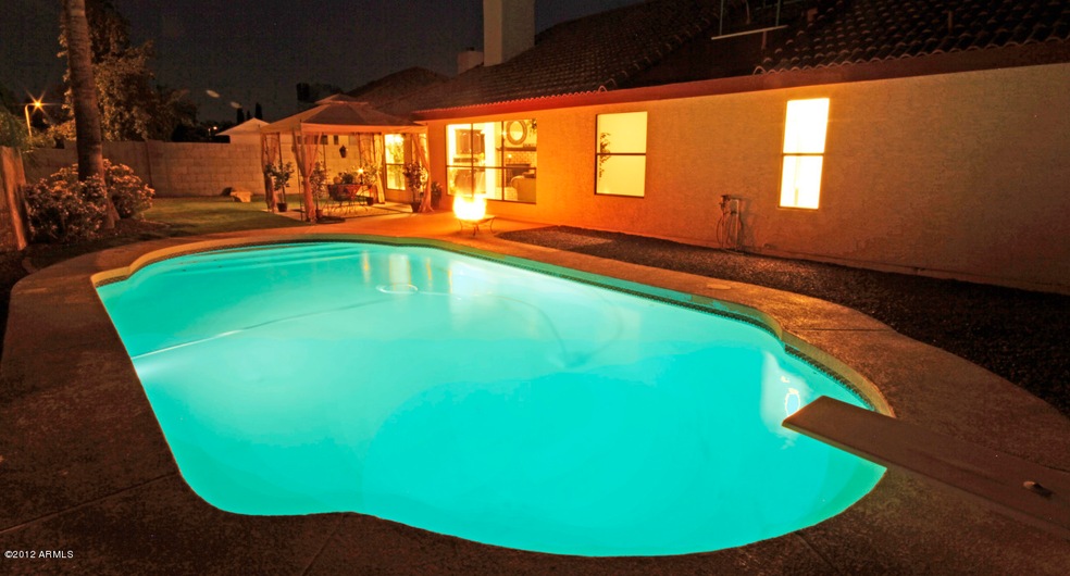 pool and grassy backyard