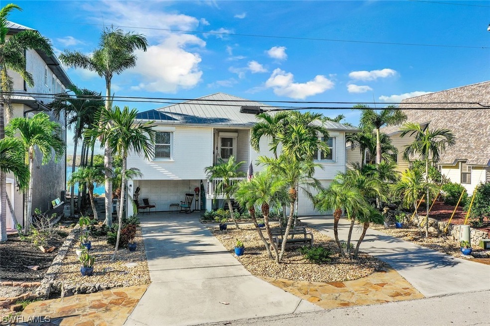 Landscaping that is tropical and easy to maintain.