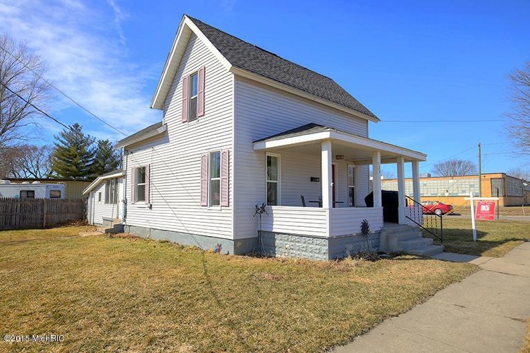 124 Amity St, Lowell, MI 49331 - photo 1