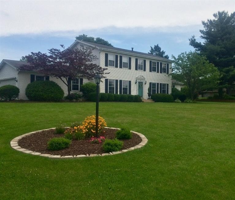 Stately 2 story traditional home on over an acre in Valparaiso.