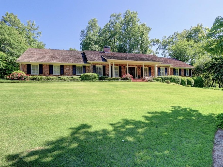 Beautifully situated on a gentle knoll on prestigi