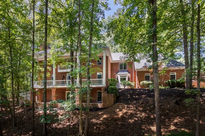 Truly majestic!  This home is set back from the st