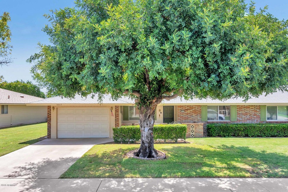 10417 W Kingswood Cir-large-001-020-Fron