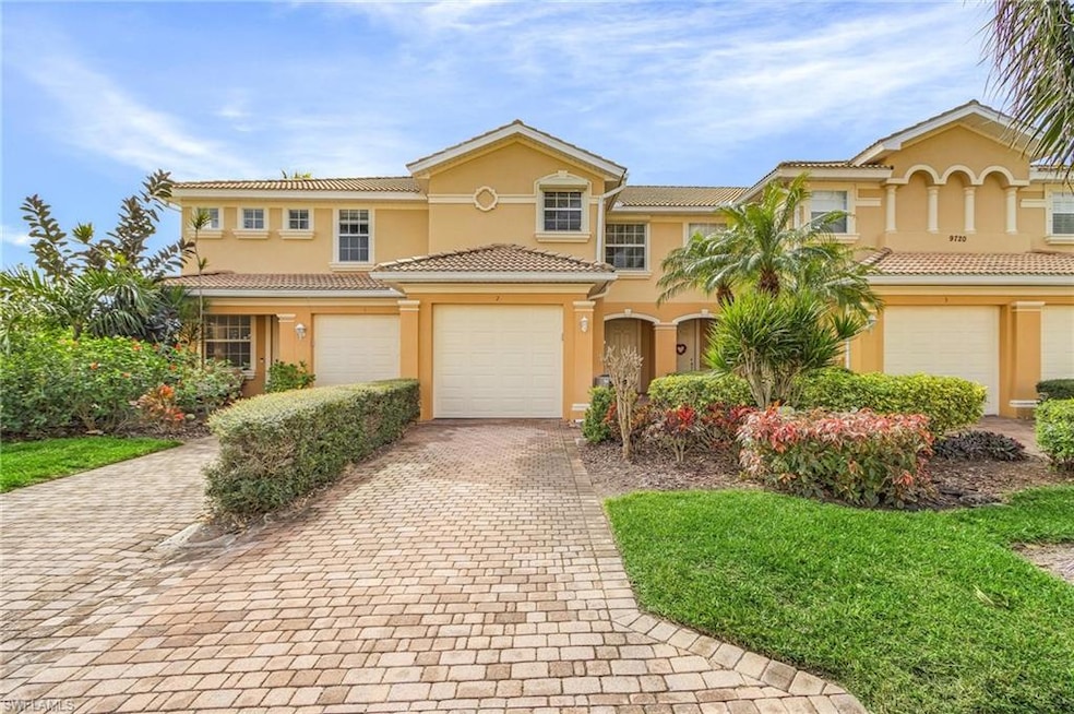 Mediterranean / spanish-style home with a garage