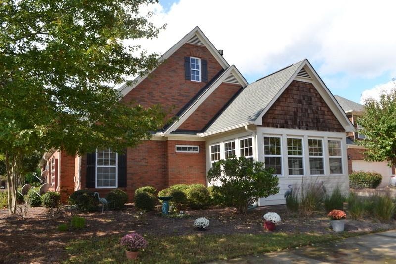 IMMACULATE HOME WITH SUNROOM IN 55+ ACTIVE ADULT C