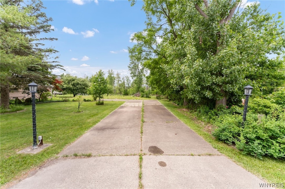 9780 Wehrle Dr, Clarence, NY 14031 - photo 1